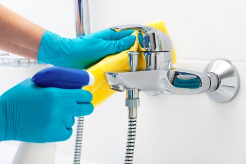 Technician reviewing room hazards and preparing safe cleaning setup